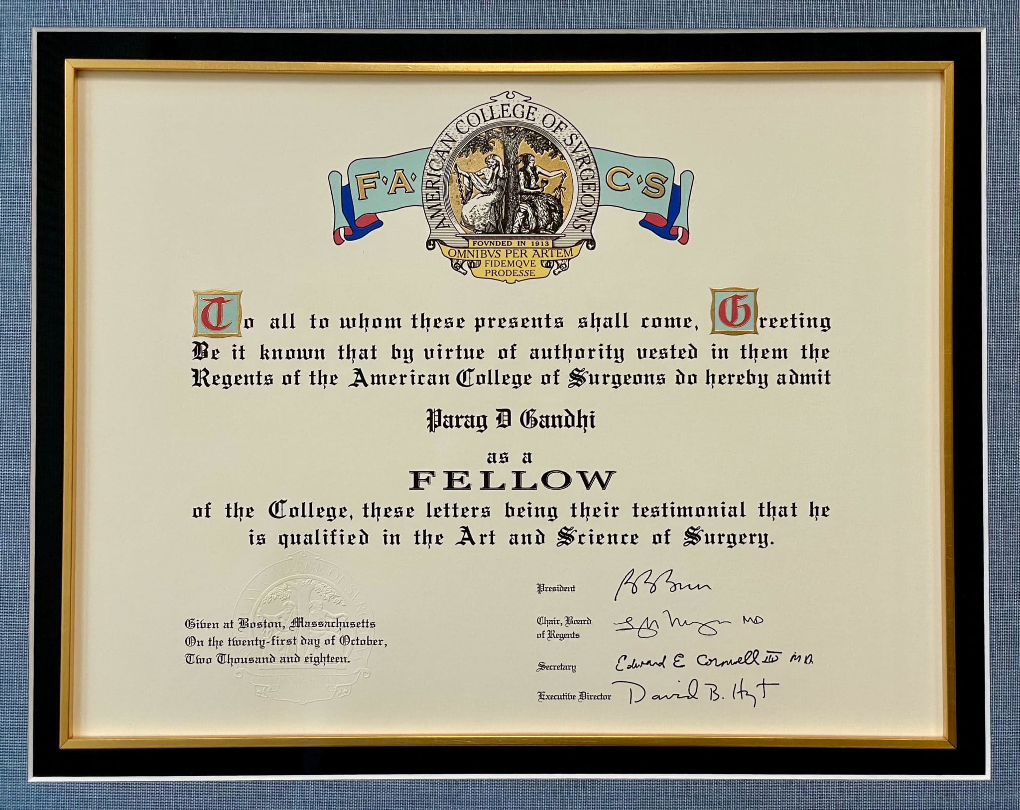 Certificate from the American College of Surgeons admitting Parag D Gandhi as a Fellow, dated October 21, 2018, with official seals and signatures.